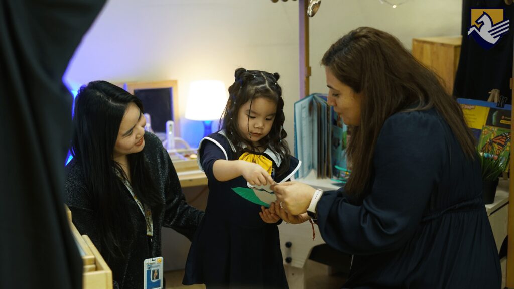 Nursery student sharing what she learned in class to her mother