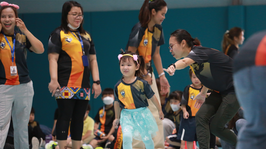 Student from House Phoenix participating in the games