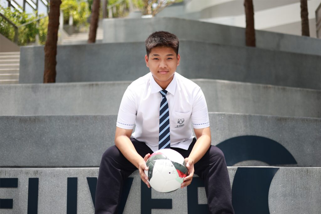 Sut Seng with Football